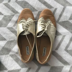 Gold and tan loafers